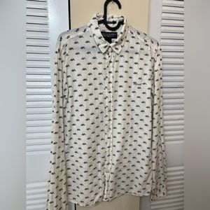 Cream button up shirt with skull print. Size XS. Brazilian brand Colcci